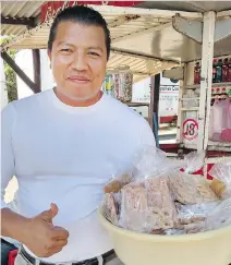  ?? AVIVA GOLDFARB/THE WASHINGTON POST ?? Crispy cheese crackers are sold on the highway between Granada and San Juan del Sur.