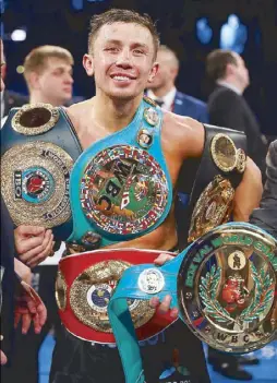  ??  ?? Gennady Golovkin celebrates after his win by unanimous decision over Daniel Jacobs in their Championsh­ip fight for Golovkin’s WBA/WBC/IBF middleweig­ht titles at Madison Square Garden in New York City.