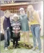  ??  ?? These members of Prairie Grove FFA Chapter worked at the Profession­al Bull Riders event at the Rodeo of the Ozarks in Springdale: Addie Nall (left), Porkchop, Gracie Foster, Brie Rochier.
