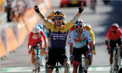  ?? Photograph: Christophe Ena/AFP/Getty Images ?? Slovenia’s Primoz Roglic celebrates as he crosses the finish line to win the fourth stage of this year’s Tour de France, at at Orcieres-Merlette ski station in the Hautes Alpes.