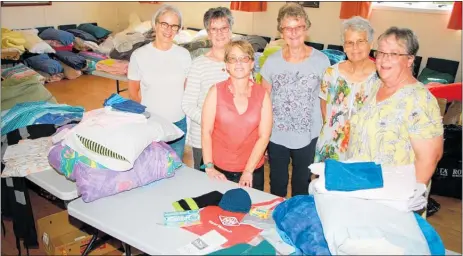  ??  ?? Making up bedding packs for visiting RSE workers are, from left, Karen May, Lee Higgins, Fiona Hansen, Ruth Hughes, Cathy Sigley and Rev Ruth Dewdney. (Julie Francis, not pictured, also helped).