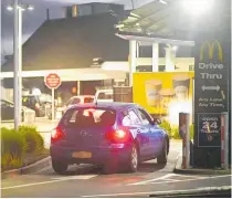  ?? ?? Early birds ensuring they were among the first in the queue for Mcdonald’s on Wednesday.