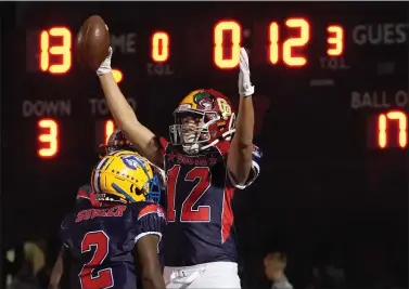  ?? PHOTO BY DON FERIA ?? Demarcus Oandasan of Cupertino High School scores a touchdown in the first half of the Charlie Wedemeyer all-star game.