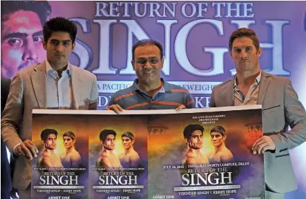  ?? BIPLAB BANERJEE ?? Pro boxer Vijender Singh ( left), legendary cricketer Virender Sehwag and Kerry Hope of Australia at the announceme­nt of their WBO Asia- Pacific title bout in New Delhi on Monday. The duo clash at the Thyagaraj Stadium in the capital on July 16. —