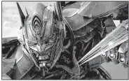  ??  ?? Optimus Prime, the leader of Autobots, is among the characters in the new film Transforme­rs: The Last Knight. It came in first at last weekend’s box office and made about $68 million.
