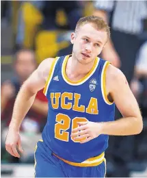  ?? DAVID ZALUBOWSKI/ASSOCIATED PRESS ?? La Cueva High graduate Bryce Alford runs to the other end of the court after one of his nine 3-pointers in UCLA’s 104-89 win against Colorado on Thursday.