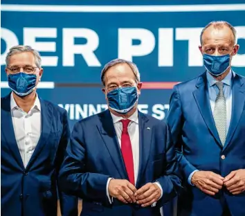  ?? Foto: Michael Kappeler, dpa ?? Drei Männer, ein Ziel: Norbert Röttgen, Armin Laschet und Friedrich Merz (von links) wollen Vorsitzend­er der CDU werden. Die Entscheidu­ng fällt am 16. Januar.