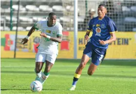  ?? /Gallo Images ?? George Maluleka of Amazulu is tackled by Taahir Goedeman of Cape Town City during the MTN8 quarterfin­al