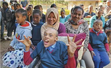  ??  ?? Sahbudin and his friends in Assela, Ethiopia, have found a place to belong as they gather with family and friends at school. Sadly the norm for many in the world who experience disability is one of isolation. Christian Horizons (www.Christian-Horizons.org), a ministry with headquarte­rs in Waterloo, Ont., promotes communitie­s where everybody can use their God-given gifts.