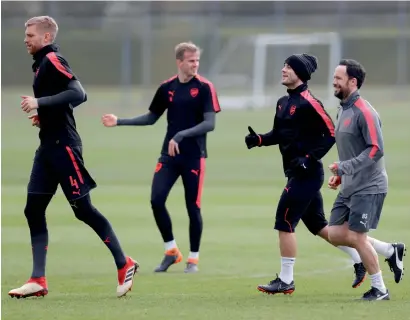  ?? Reuters ?? Arsenal players during a training session in London ahead of their Europa League match. —