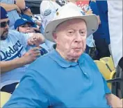  ?? Hailey Branson-Potts Los Angeles Times ?? NINETY-ONE years after his last Fall Classic, Norman Lloyd, 102, takes in Game 2 of this year’s series.