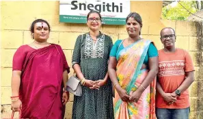  ?? ?? Malaika (second from left) with members of Snegithi