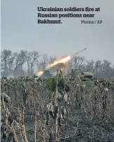  ?? Photos / AP ?? Ukrainian soldiers fire at Russian positions near Bakhmut.