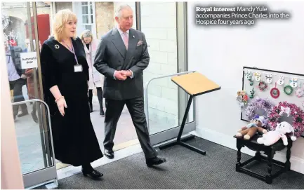  ??  ?? Royal interest Mandy Yule accompanie­s Prince Charles into the Hospice four years ago