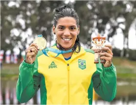  ??  ?? Ana Marcela Cunha conquistou o ouro nos 10km da maratona aquática