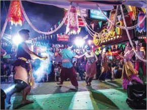  ?? ROBERTO SCHMIDT/AFP ?? Performers dance during a staged event on March 29 used to highlight a push by the city of Pattaya to promote safety in the area.