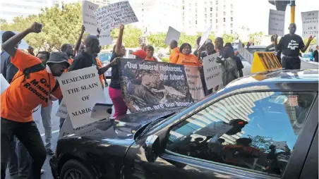 ?? PICTURE: TRACEY ADAMS ?? MINING ANGER: Around 80 people from the Alternativ­e Mining Indaba group assembled at St George’s Cathedral in Wale Street and marched to the CTICC, where they protested during last year’s Mining Indaba Conference.