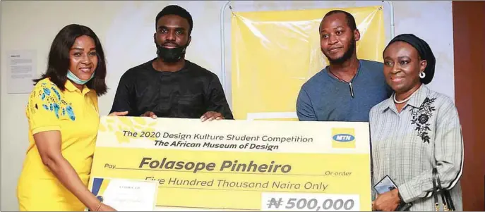  ?? ?? Manager, Sponsorshi­p and Promotions, MTN Nigeria, Njide Ken-Odogwu; Friends and Team Members of Folasope Pinheiro (Winner, Design Kulture Student Competitio­n), Seyi Oyesiku and Folarin Adefemi, and Mother of Folasope Pinheiro, Honourable Justice Yetunde Pinheiro, accepting the cash prize on his behalf, at the Design Kulture Student Competitio­n Presentati­ons, in Lagos