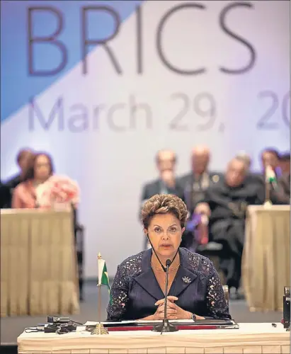  ?? GRAHAM CROUCH / BLOOMBERG ?? Dilma Rousseff, en la cuarta cumbre de los países denominado­s BRIC, celebrada en marzo en Nueva Delhi