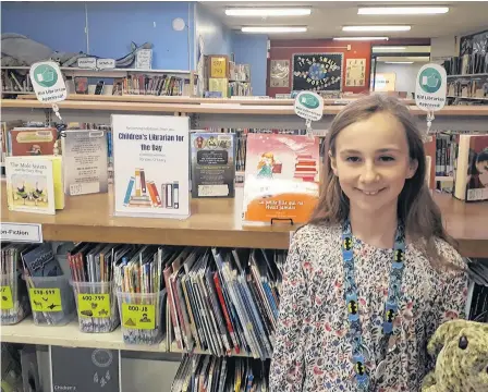  ?? — CONTRIBUTE­D ?? Kirsten O’leary, 10, who served as the Provincial Children’s Librarian for a day after winning a summer reading contest through the Newfoundla­nd and Labrador Public Libraries.