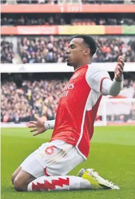  ?? Picture: AFP ?? OPENING STRIKE. Arsenal’s Gabriel Magalhaes celebrates after scoring the first goal during their English Premier League match against Crystal Palace at the Emirates on Saturday.