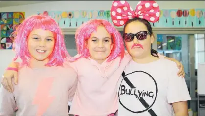  ??  ?? Keira Smith (left), Lily Smith and Vanessa Lawson were part of Pink Shirt Day at Golden Sands School.
