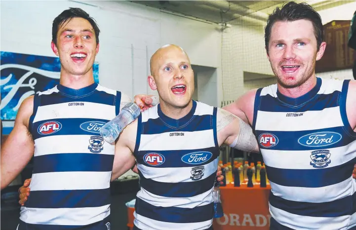  ?? Picture: GETTY IMAGES ?? BIG TIME: Jack Henry sings the Cats song with superstars Gary Ablett and Patrick Dangerfiel­d after their win over Collingwoo­d yesterday.