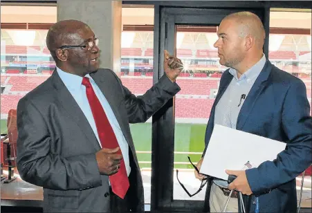  ?? Picture: FREDLIN ADRIAAN ?? SHARING IDEAS: Nimrod Mqulwana, of Nelson Mandela Bay’s office of the speaker, and the Bay’s DA chief whip, councillor Werner Senekal, discuss matters brought up at an exchange programme with Johannesbu­rg officials, held at the Nelson Mandela Bay Stadium