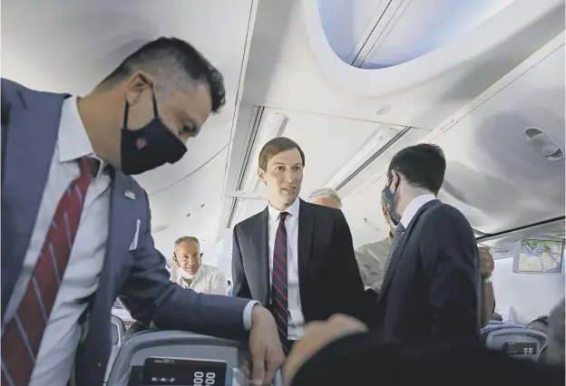  ??  ?? 0 US presidenti­al adviser Jared Kushner stands on board an El Al aircraft carrying a Us-israeli delegation to the UAE following a normalisat­ion accord