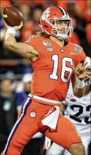  ?? STREETER LECKA / GETTY IMAGES ?? Tigers QB Trevor Lawrence committed to Clemson before his junior season and immediatel­y lived up to his billing, leading Clemson to the national championsh­ip as a freshman last year.