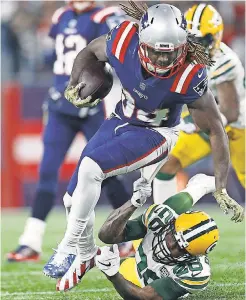  ?? GREG M. COOPER/USA TODAY SPORTS ?? Patriots wide receiverre­turner Cordarrell­e Patterson rushed for a teamhigh 61 yards and a TD Sunday against the Packers.