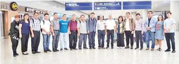  ??  ?? From ninth left, Chin, Soh, Liew and other delegates arriving at Shanghai Pudong Internatio­nal Airport.