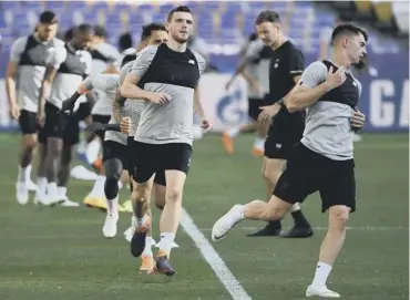  ??  ?? Liverpool defender Andrew Robertson trains in the Olympic Stadium in Kiev ahead of tonight’s final.