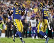  ?? HARRY HOW / GETTY IMAGES ?? Los Angeles defensive linemen Ndamukong Suh and Michael Brockers will be looking to advance to their first Super Bowl.