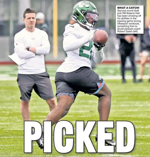  ?? ?? WHAT A CATCH! Second-round draft pick RB Breece Hall has been showing off his abilities in the passing game during offseason workouts, something that no doubt pleases coach Robert Saleh (left).