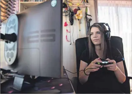  ?? Photo: David Harrison ?? Behind the screen: Bravado Gaming’s Jessica Maij at her gaming setup in Cape Town. She stopped playing Call of Duty competitiv­ely due to bias against women, but finds Gwent more welcoming.