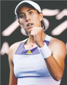  ?? WILLIAM WEST/AFP VIA GETTY IMAGES ?? Spain’s Garbine Muguruza celebrates after beating Simona Halep of Romania in their semifinal match 7-6(8), 7-5 at the Australian Open on Thursday in Melbourne.