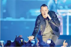  ??  ?? (Right) Chester Bennington of the band Linkin Park performs during the second day of the 2012 iHeartRadi­o Music Festival at the MGM Grand Garden Arena in Las Vegas, Nevada Sept 22, 2012. — Reuters file photo