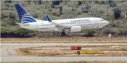  ??  ?? A Copa Airlines SA plane lands at Simon Bolivar Internatio­nal Airport in Maiquetia, Vargas state, Venezuela. (Bloomberg file photo)