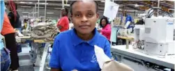  ??  ?? Ms Nancy Wakajiathi, an employee of Hela Company located at the Export Processing Zone in Athi River.