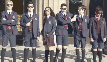  ??  ?? Based on the comics written by My Chemical Romance alum Gerard Way,The Umbrella Academy introduces a new gang of superpower­ed misfits led by Ellen Page, Tom Hopper, and Robert Sheehan.