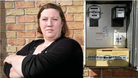  ?? Photo: Bev Lacey ?? POWER PRICES: Ashly Peterson is looking for answers after she and other Toowoomba residents have had a nasty shock with their power bills doubling.