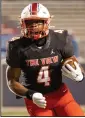  ?? More photos at arkansason­line.com/1118parkvi­ewfb/
(Arkansas Democrat-Gazette/ Justin Cunningham) ?? Running back Darien Bennett of Little Rock Parkview carries in the Patriots’ 42-0 victory over Wynne on Thursday night at War Memorial Stadium in Little Rock. Little Rock Parkview ran for over 200 yards and scored 4 touchdowns on the ground.