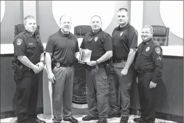  ??  ?? The Ringgold Police Department recently placed second in an annual “Governor’s Challenge” competitio­n held by the Georgia Governor’s Office of Highway Safety. Pictured from left, officer Jordan DeJesus, chief Dan Bilbrey, assistant chief Chad Cardin,...