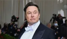  ?? Angela Weiss/AFP via Getty Images ?? On Tuesday, Elon Musk said he would lift Twitter’s ban on former President Donald Trump if Mr. Musk’s deal to buy the global messaging platform is successful.