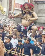  ?? ?? Children carrying an ogoh-ogoh during the Tawur Kesanga parade