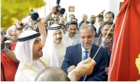  ?? Photo by M. Sajjad ?? sheikh Majid bin saeed Al Nuaimi and Navdeep singh suri during the inaugural ceremony of H.H sheikh Humaid Bin Rashid Al Nuaimi Auditorium and sports Complex at indian Associatio­n in Ajman . —