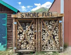  ?? Josie Sexton, The Denver Post ?? A sign for “s’more fuel” in the town of Twin Lakes (population: 196) near Leadville.