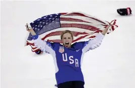  ?? ASSOCIATED PRESS ?? JOCELYNE LAMOUREUX-DAVIDSON (17), of the United States, celebrates after winning against Canada in the women’s gold medal hockey game at the 2018 Winter Olympics in Gangneung, South Korea, Thursday.