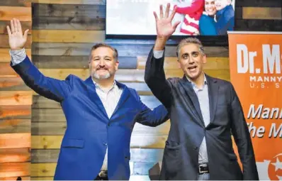  ?? ANDREW NELLES/THE TENNESSEAN VIA AP ?? Sen. Ted Cruz, R-Texas, left, and Republican U.S. Senate candidate Dr. Manny Sethi wave after speaking during a town hall meeting Friday at Music City Baptist Church in Mt. Juliet, Tenn.